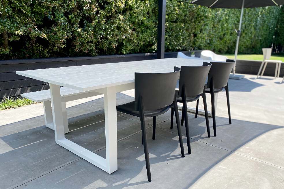 outdoor table bench black chairs
