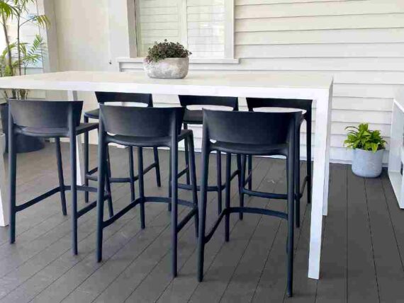 long white outdoor bar table and chairs