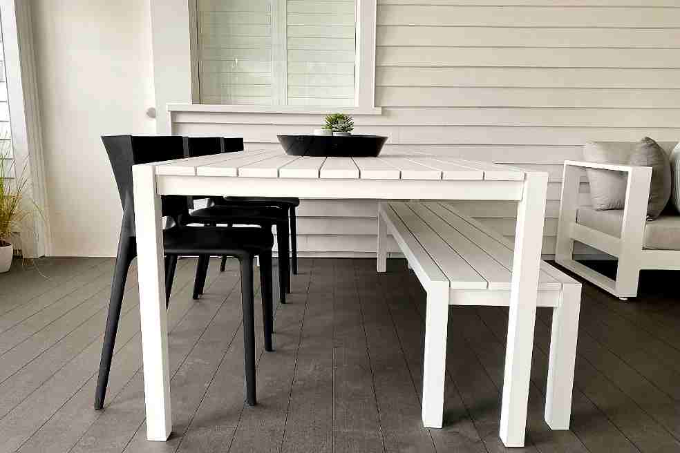 modern minimalist outdoor dining table with bench and chairs