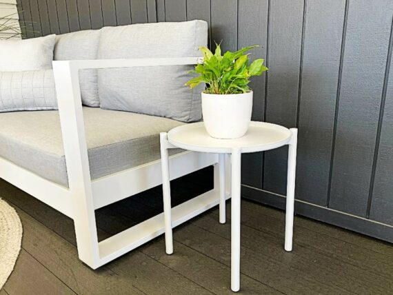 small round white outdoor side table with tray