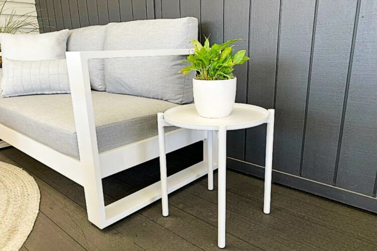 small round white outdoor side table with tray