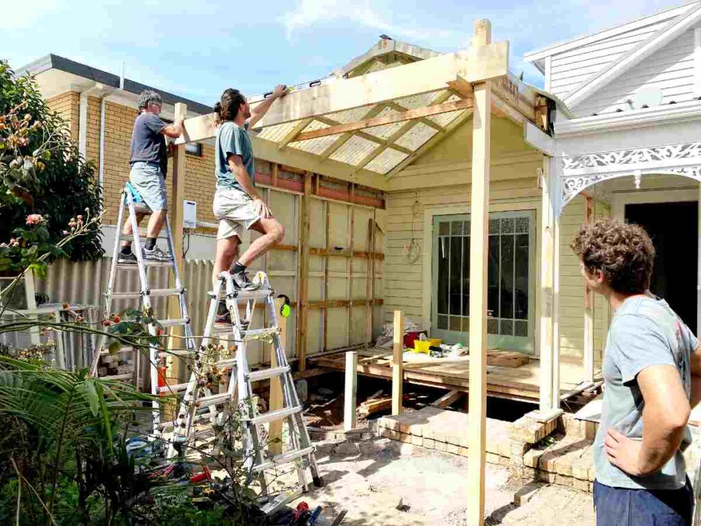 Hexagonal roof removed from villa outdoor area during renovation.